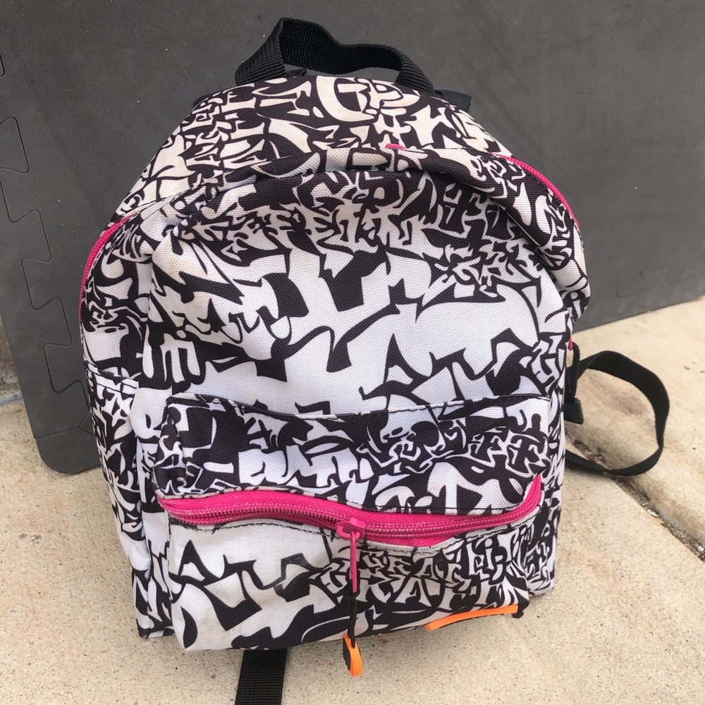 Black and White Graphic Backpack with Pink Accents